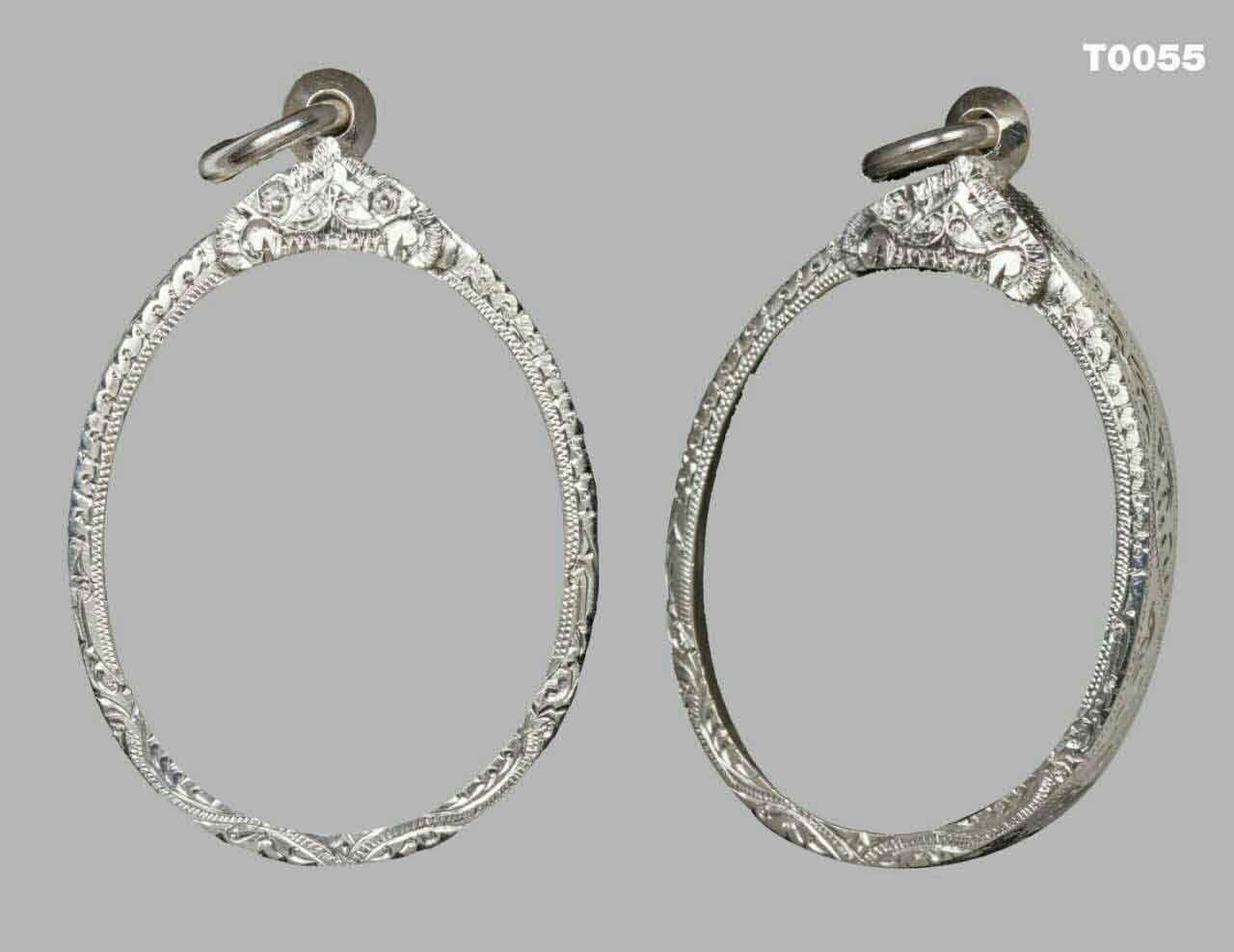 กรอบหน้าเรียบเงินสิงห์เดี่ยว ตรงกลางลายแข้งสิงห์ ล่างแกะลายพญานาค